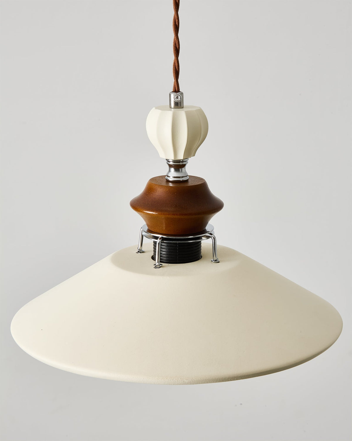 The Adelaide Pendant Light shown with an Edison bulb.