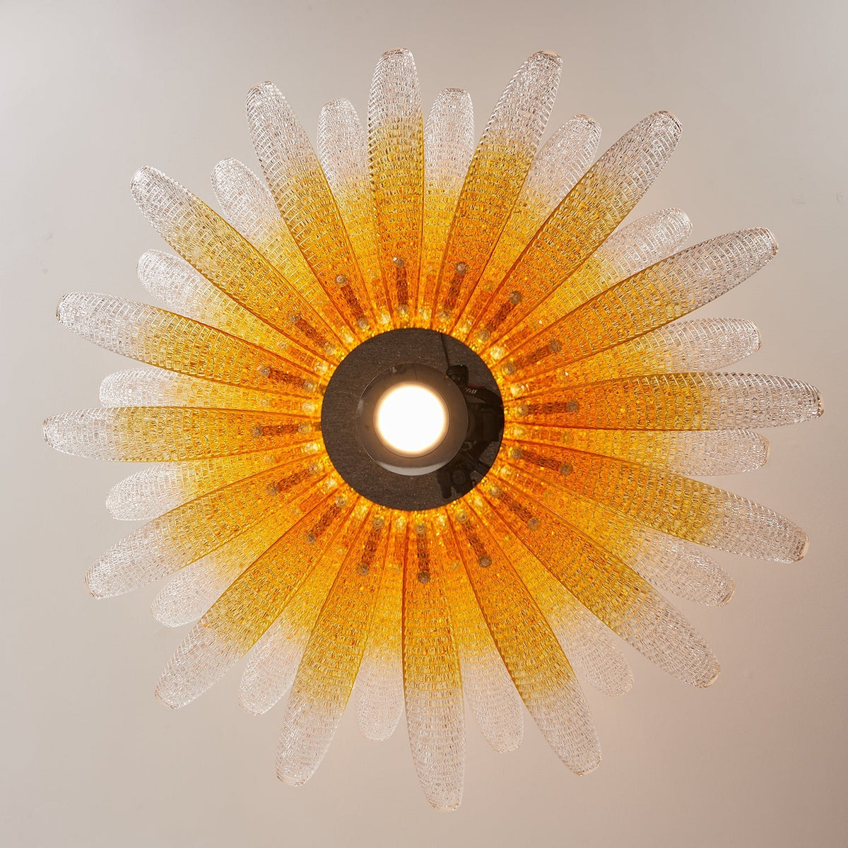 Agave Starburst Chandelier in a modern living room setting.