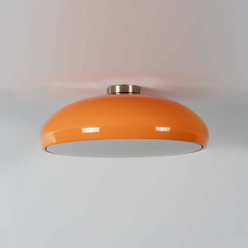 The Aicia Ceiling Light casting a warm glow in a hallway.