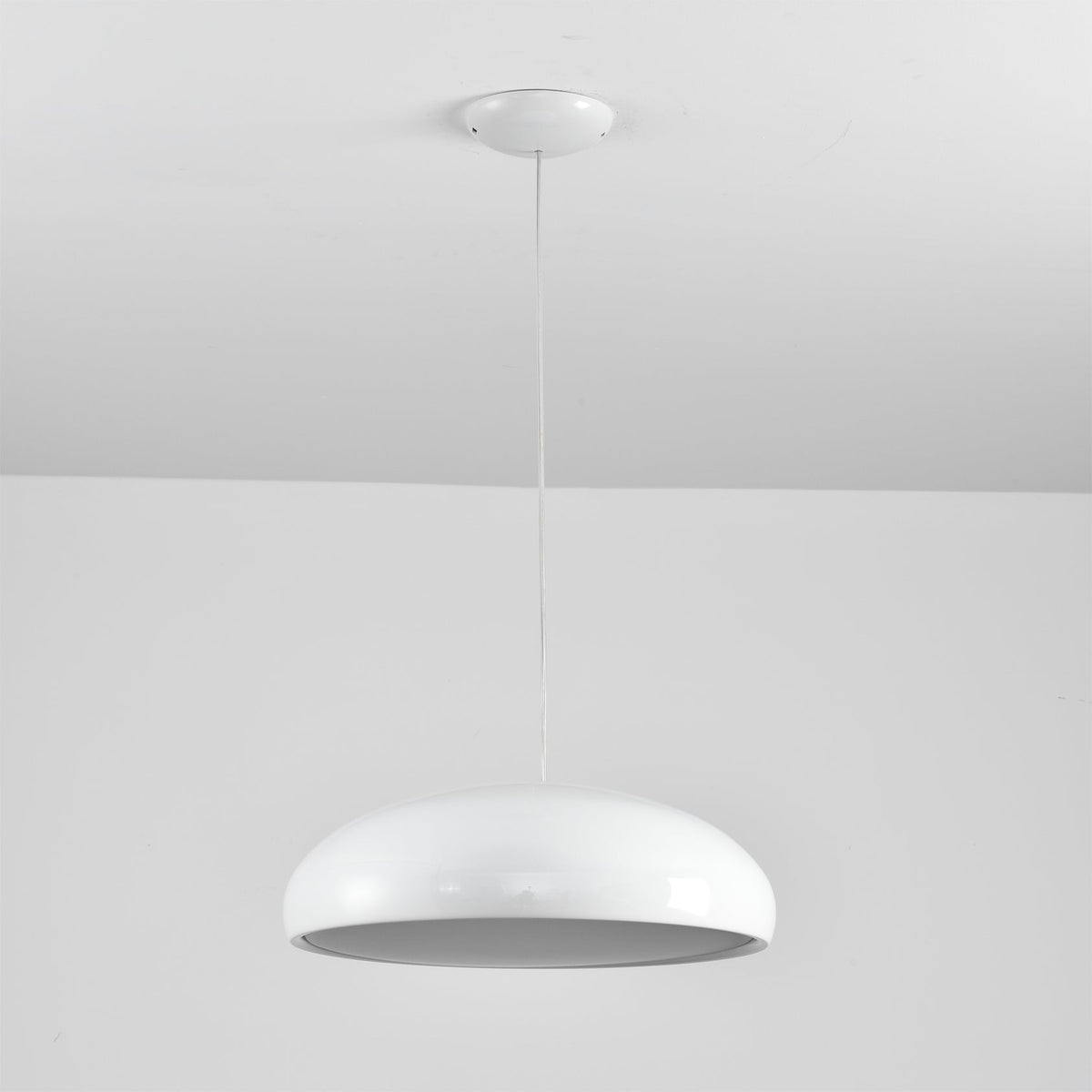 The Aicia Pendant Light shown in beige.