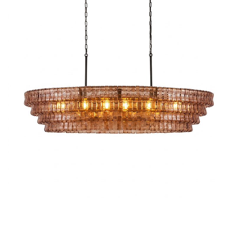 The Albano Chandelier's green glass panels catching the light.