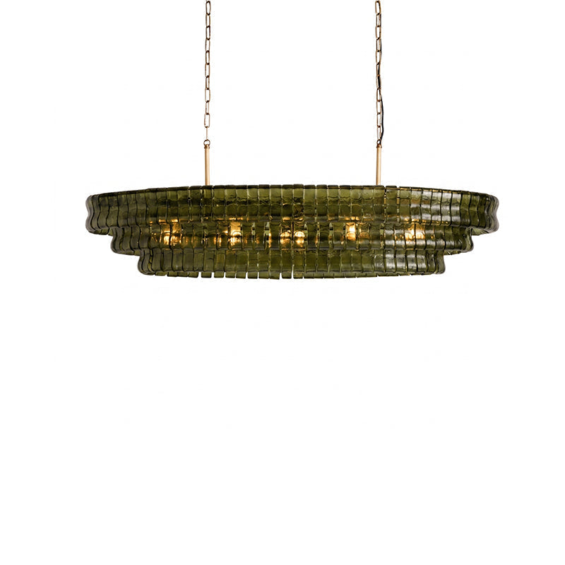 The Albano Chandelier illuminating a luxury kitchen island.