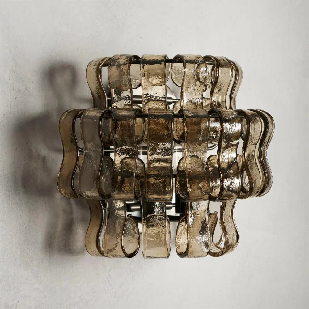 The elegant gold glass Albano Wall Lamp in a luxurious setting.