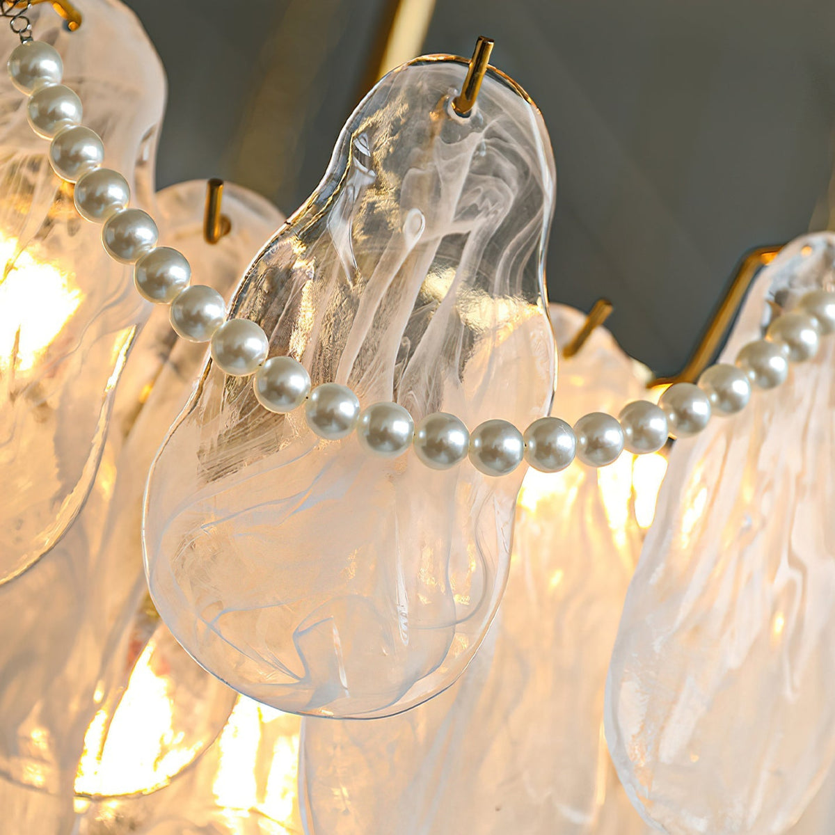 Side profile of the Alessia Chandelier showcasing its height and layers.