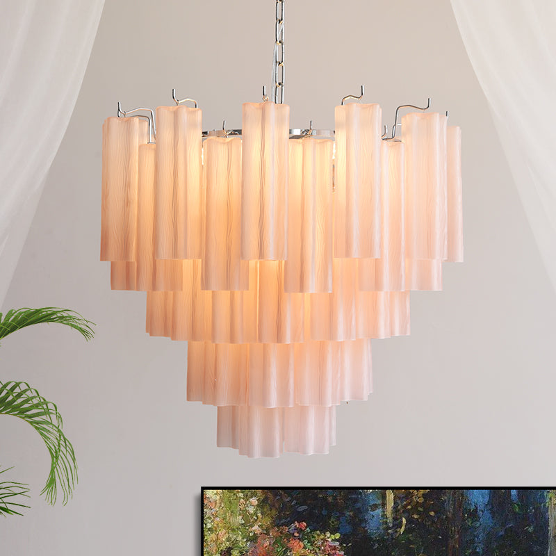 The Alistair Chandelier illuminating a modern dining room.