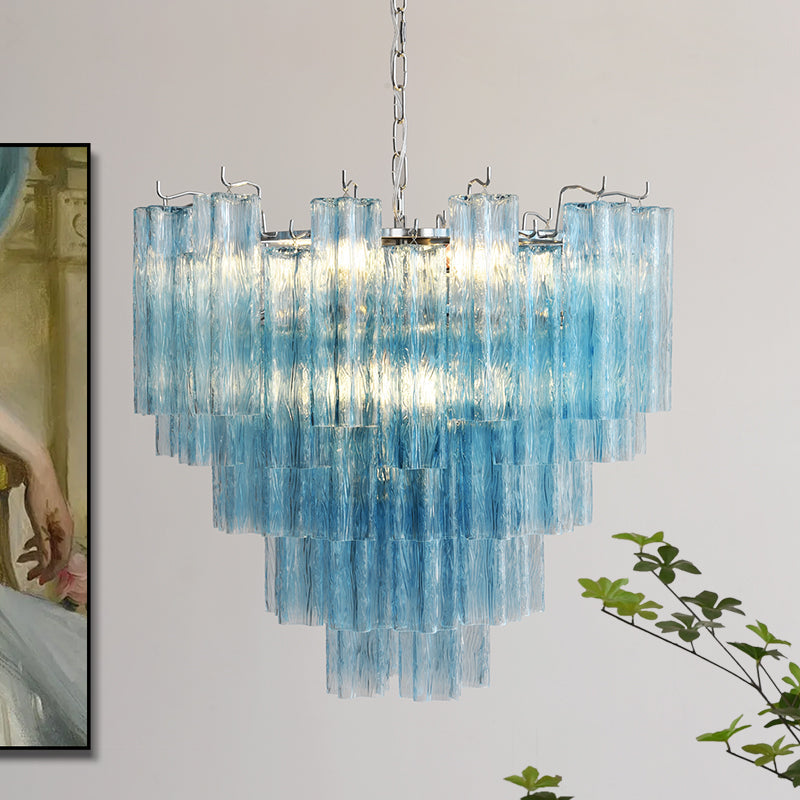 The Alistair Chandelier hanging over a dining table.