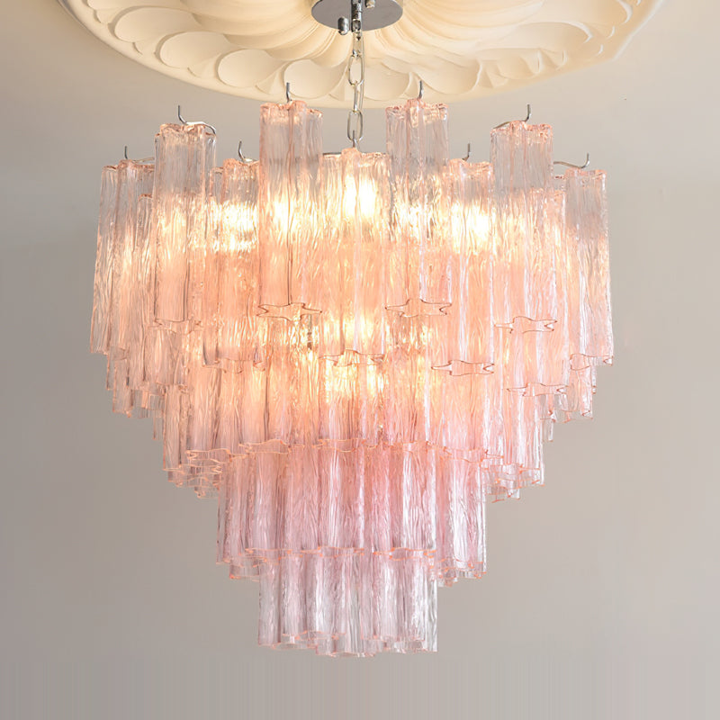 Lifestyle image of the Alistair Chandelier in a high-ceiling foyer.