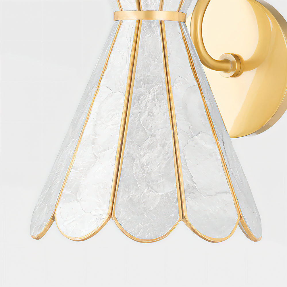 Detail shot of the solid brass construction and mounting plate of the Alito wall light.
