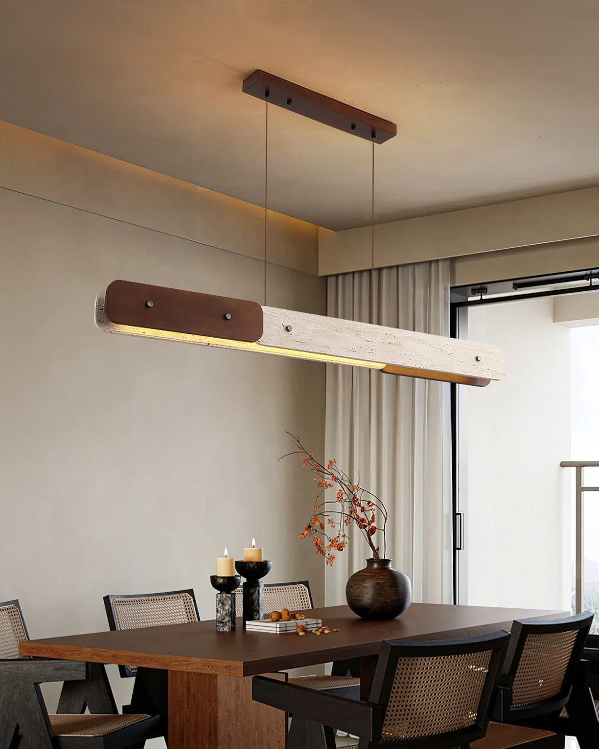 Angled view of the Aluet Linear Chandelier, highlighting its elongated form.