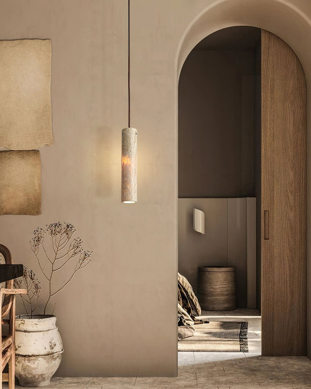 Three Arlene Pendant Lamps hanging in a row over a kitchen island.