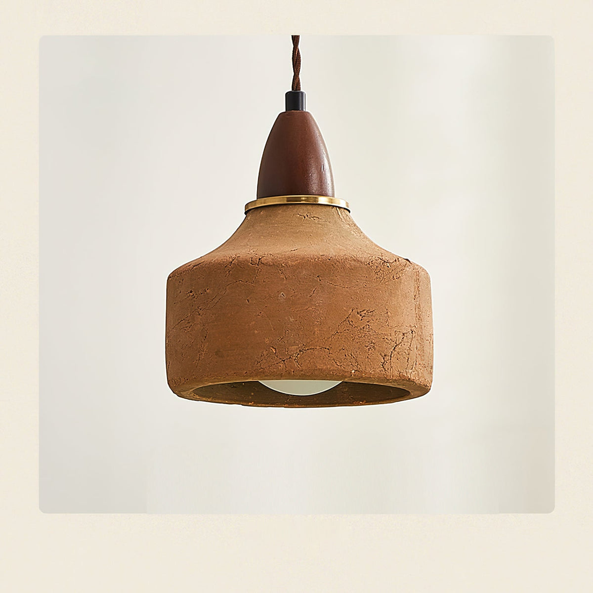 A pair of Auburn Pendant Lights hanging over a kitchen island.