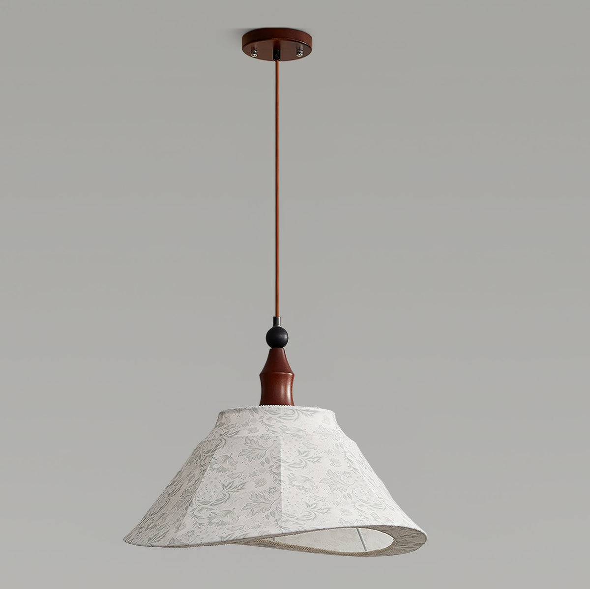 Aurelian Pendant Light in a living room, highlighting its natural charm.