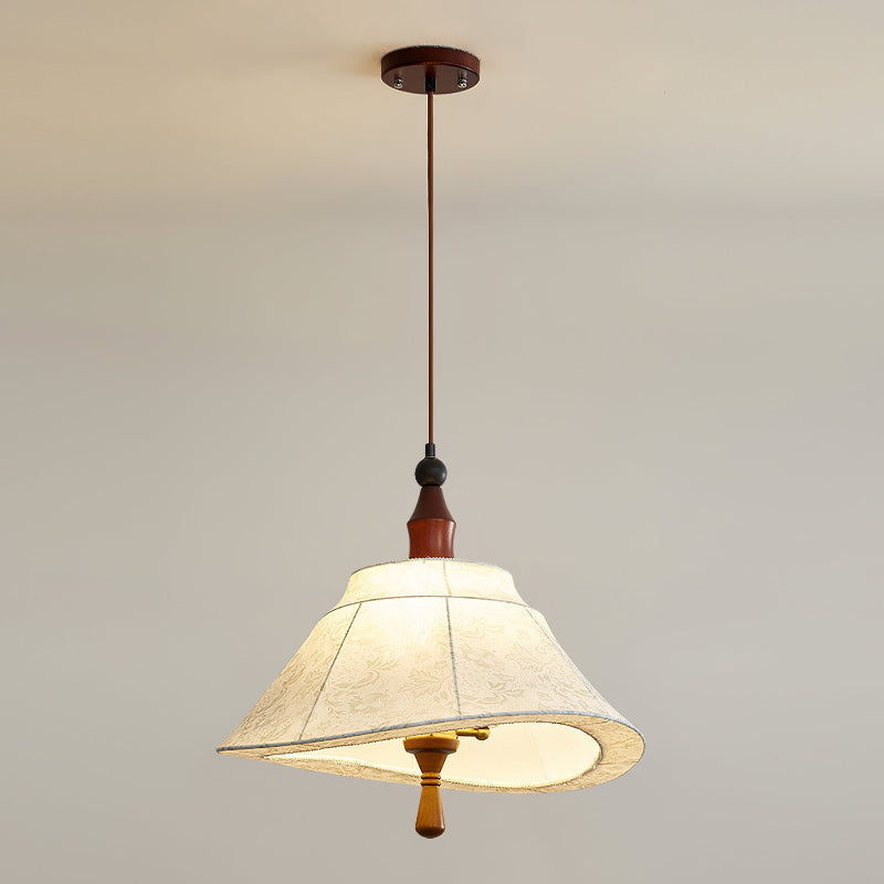 The Aurelian Pendant Light used as a centerpiece in a dining area.