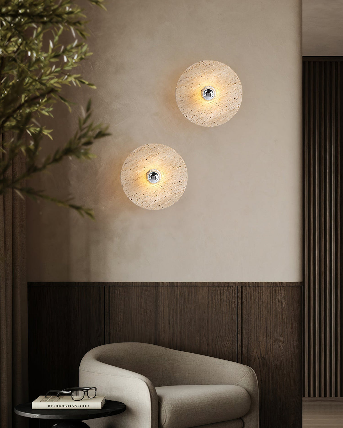 The Avize Travertine Ceiling Lamp hanging over a dining area.