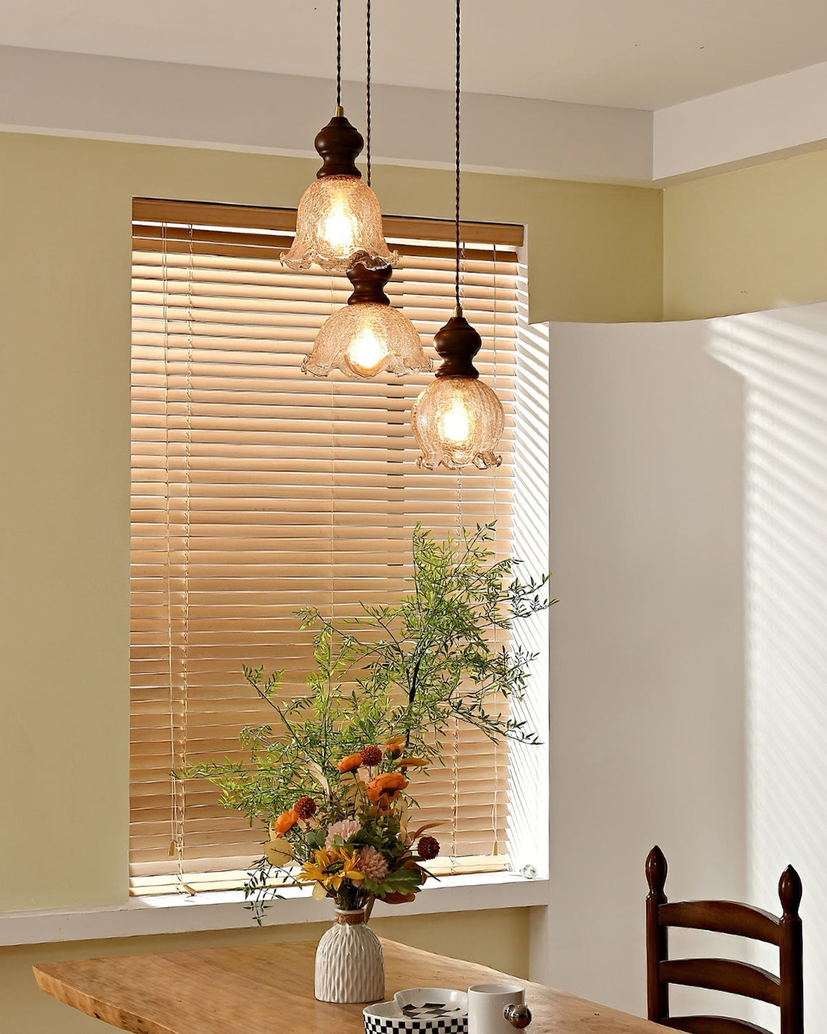 A single Barron Pendant Light illuminating a cozy reading nook.