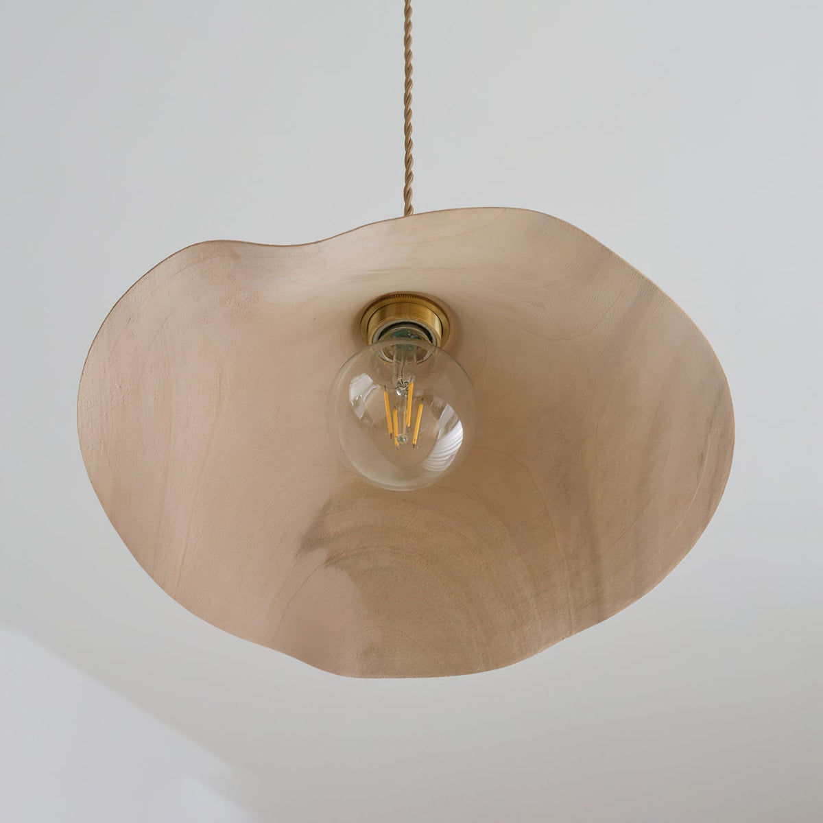 Lifestyle image featuring the Baxter Pendant Light in a kitchen setting.