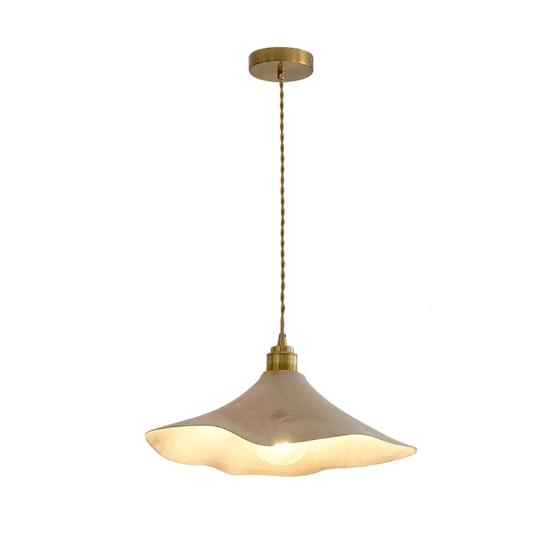 The Baxter Pendant Light shown from a distance in a room setting.
