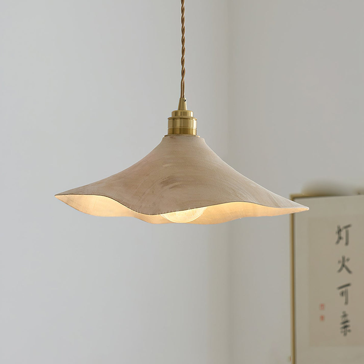 Close-up of the Baxter Pendant Light's layered wood construction.