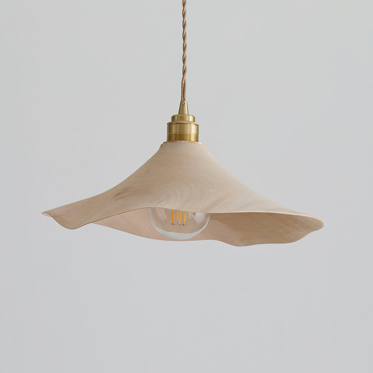 Two sizes of the Baxter Pendant Light shown for comparison.