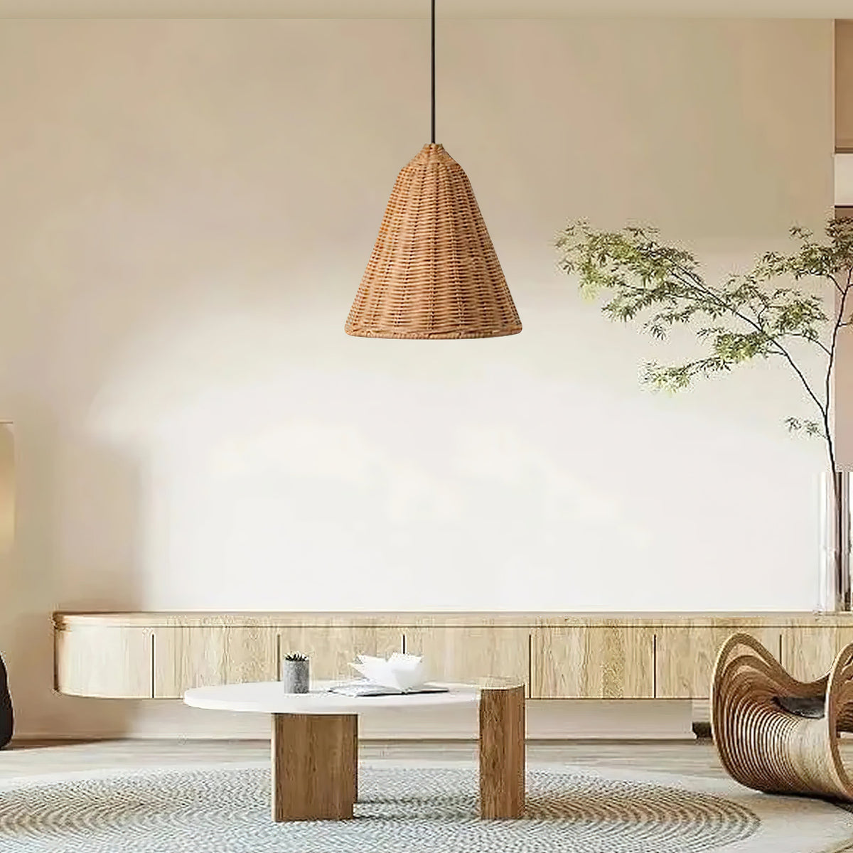 The 3-light cluster model hanging above a wooden dining table.