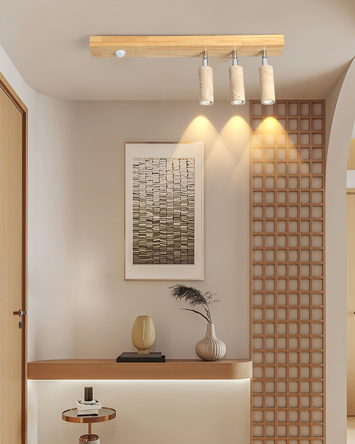 Front view of the Berge ceiling light against a neutral wall.
