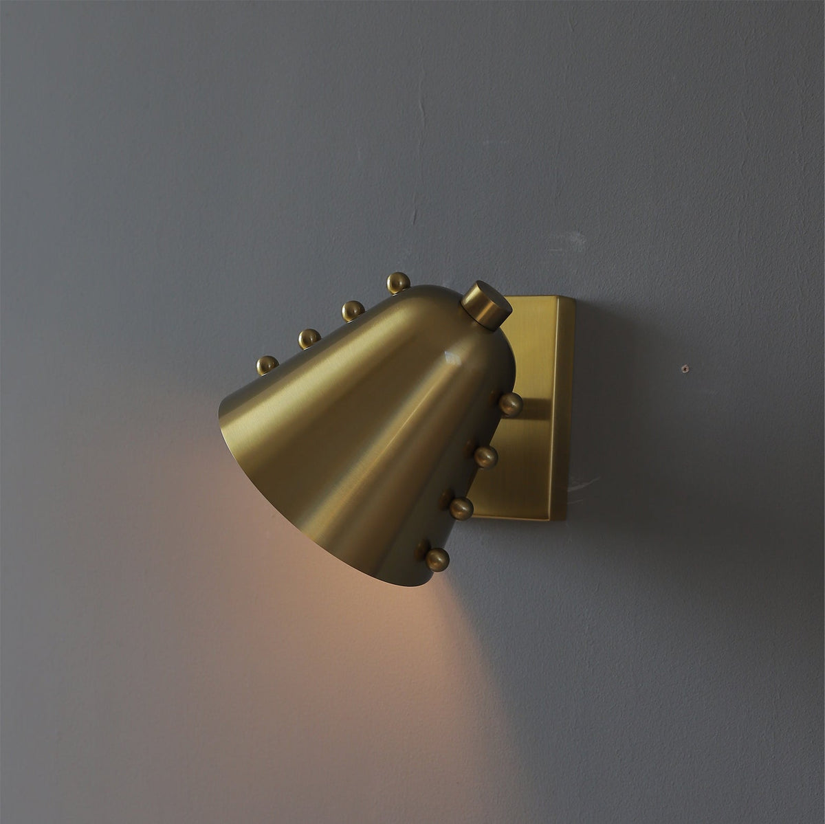 Abstract shot of the Bespoke wall lamp's lines and angles.