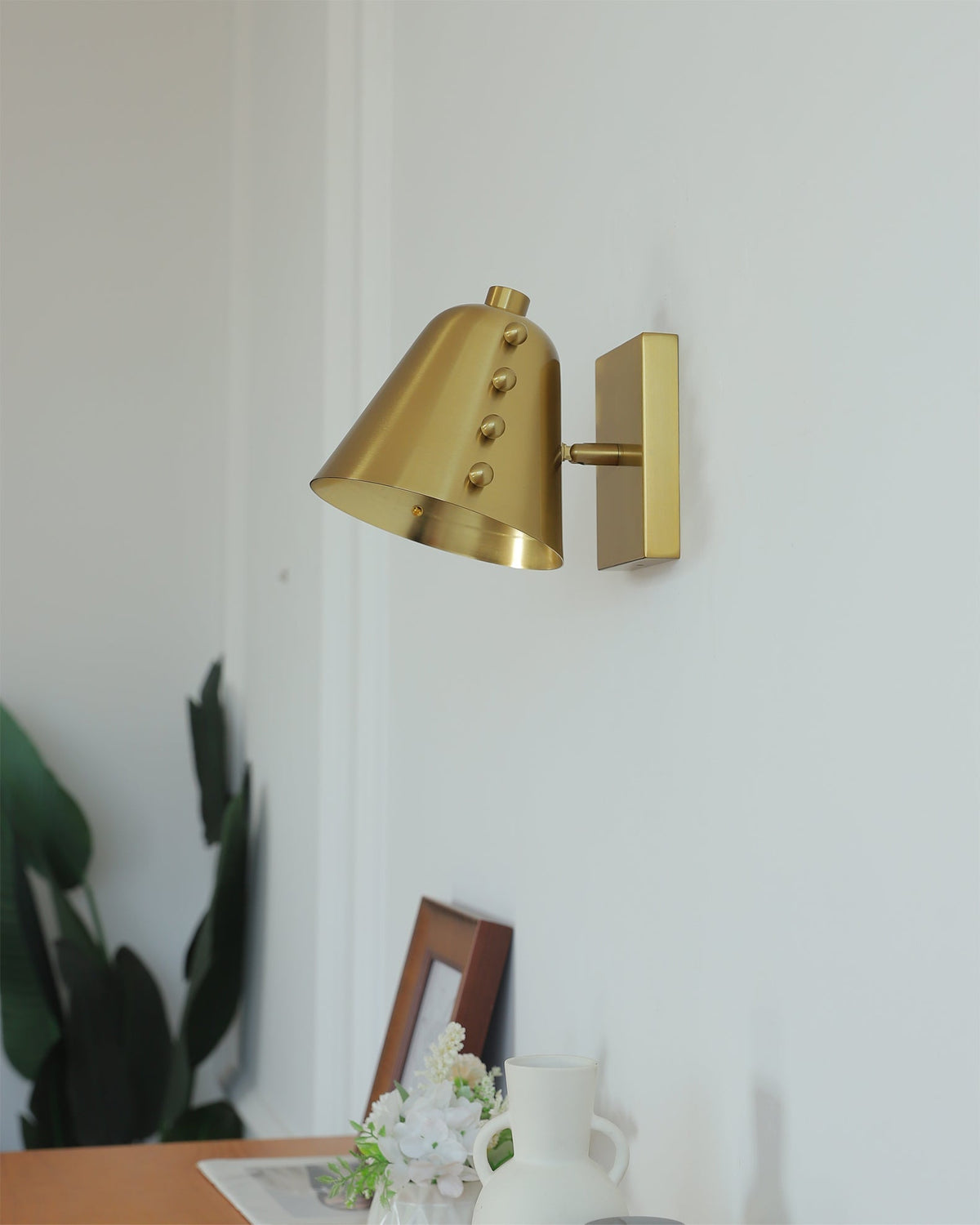 Bespoke wall lamp shown in chrome finish.