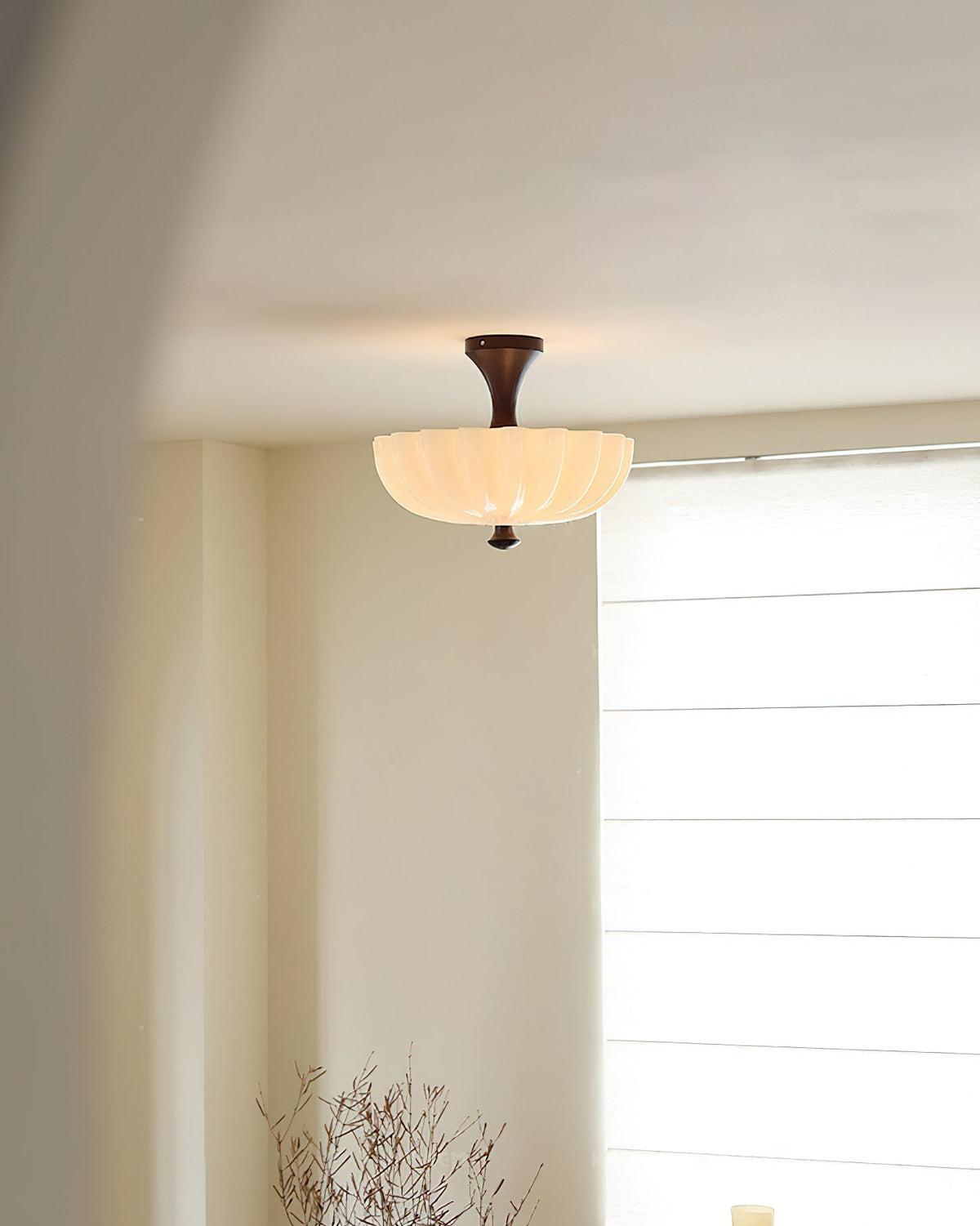 Bofea Ceiling Lamp in walnut wood finish against a neutral wall.