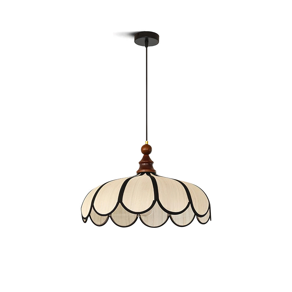 Botan Pendant Light with a scalloped abaca shade and black trim.