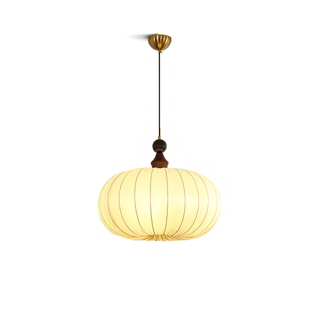 Bowie Pendant Light with a white fabric shade and wood accents in a modern living room.