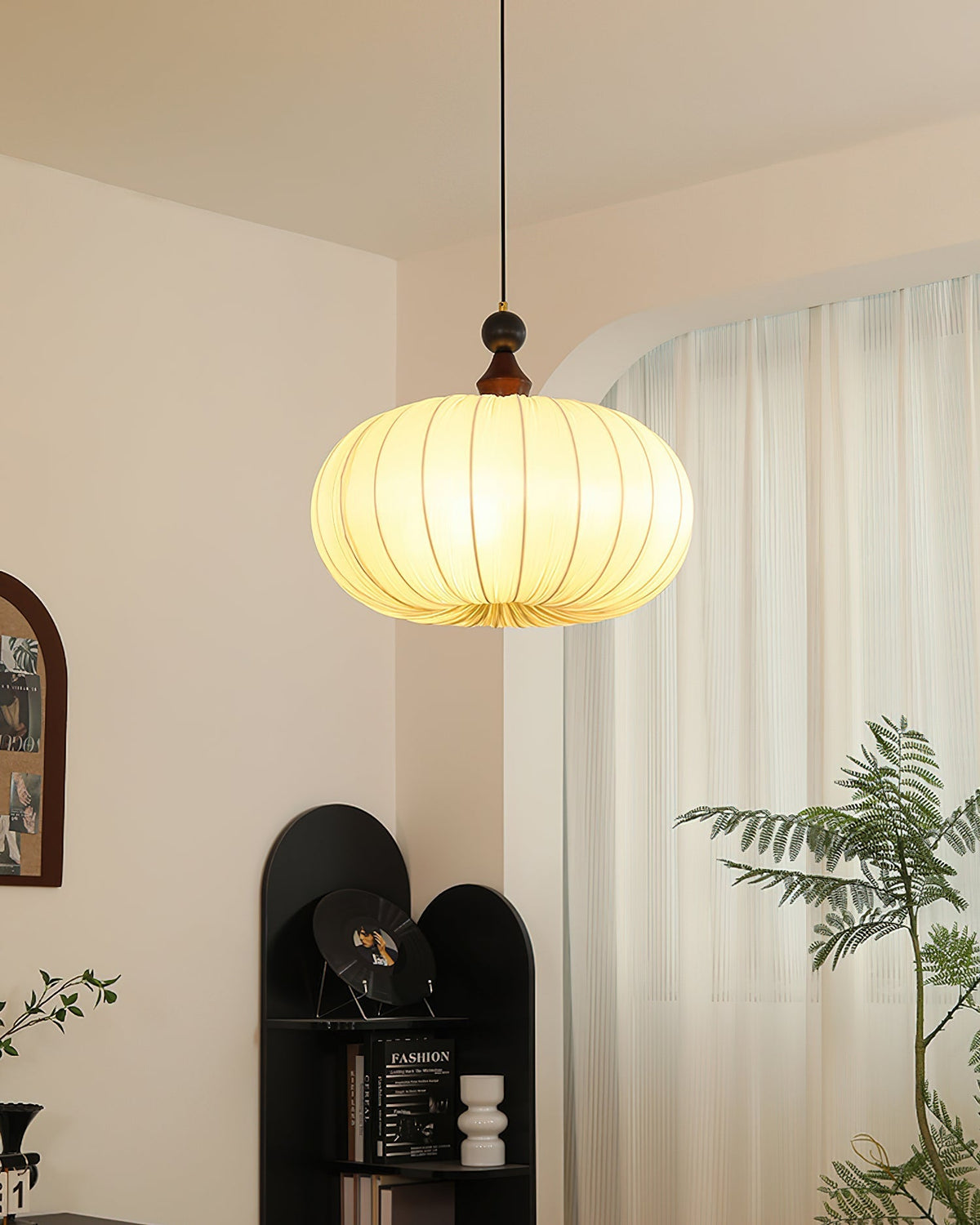 Detail shot of the wooden top accent of the Bowie Pendant Light.