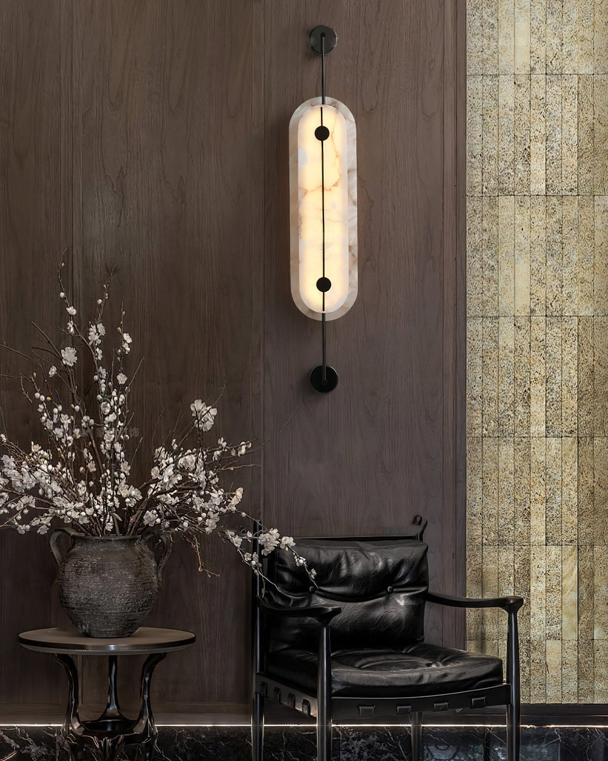 The wall lamp shown in a hallway, providing ambient light.