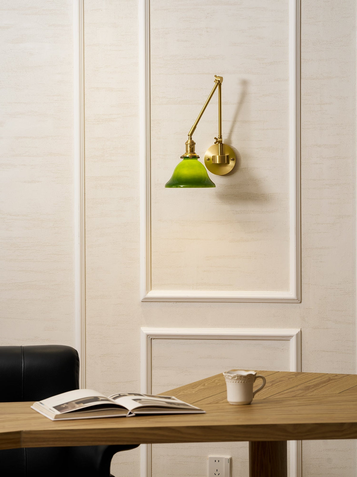 The smooth finish of the green metal shade.