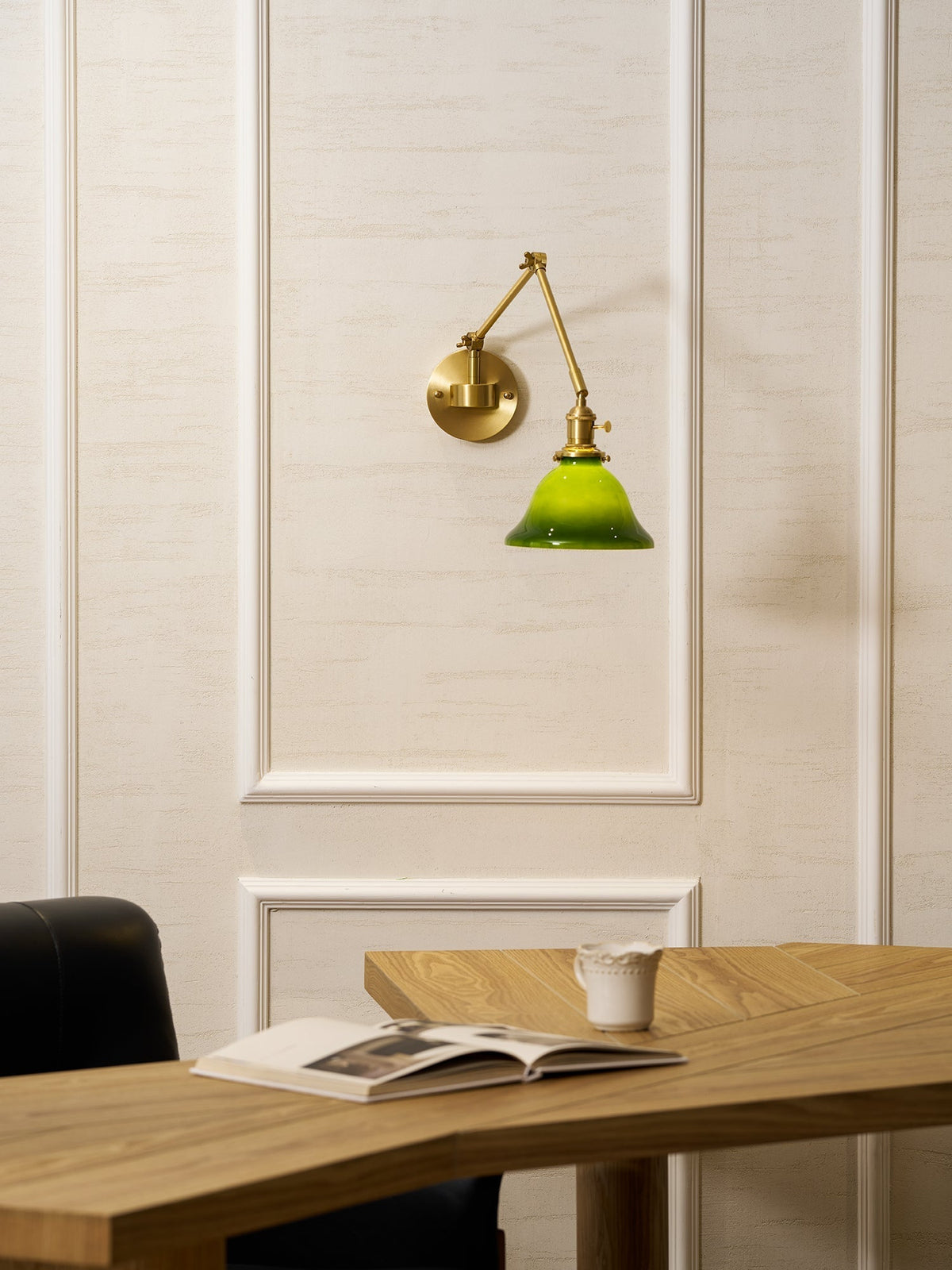 Brady wall lamp in a reading nook setting.