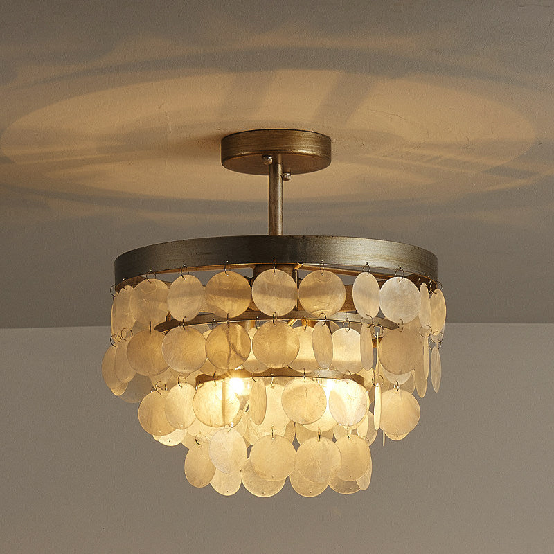 The black Brielle Ceiling Lamp over a dining table.