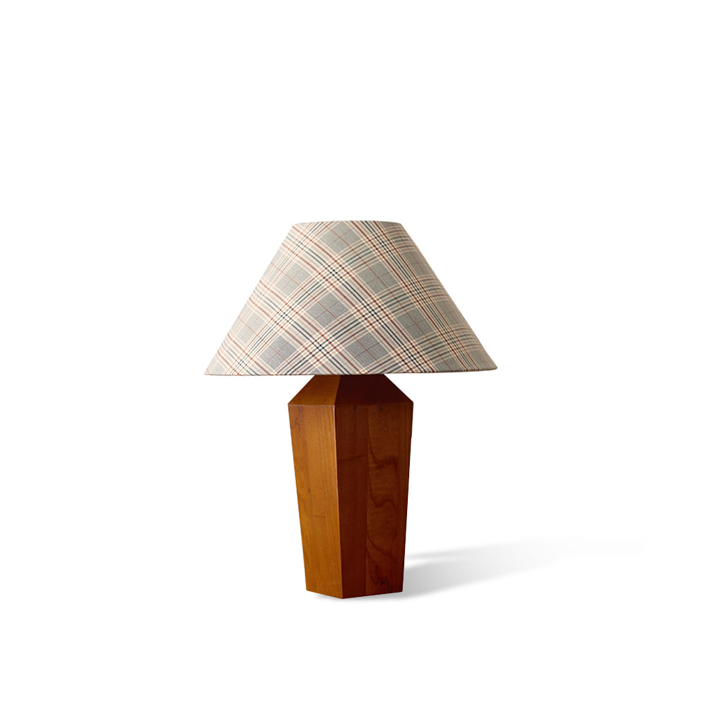 Cabin Table Lamp with a plaid fabric shade and geometric wood base.