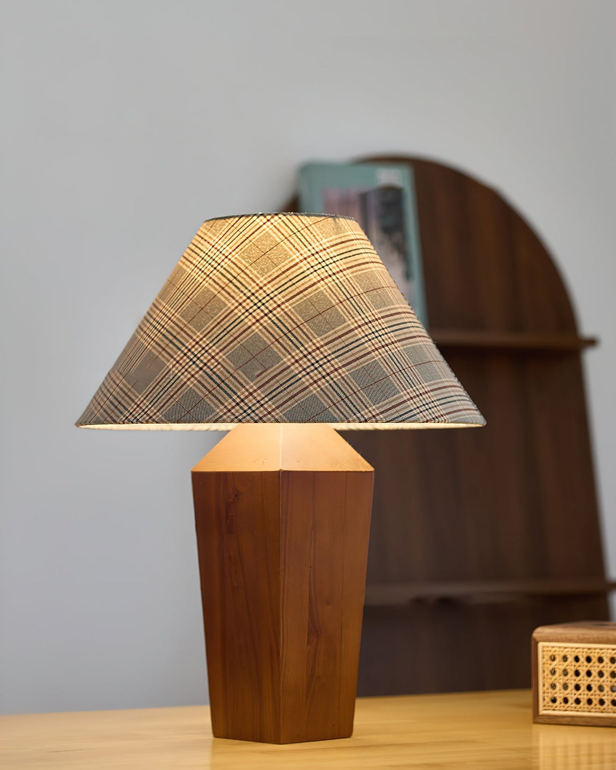 View of the lamp's base and the start of the electrical cord.