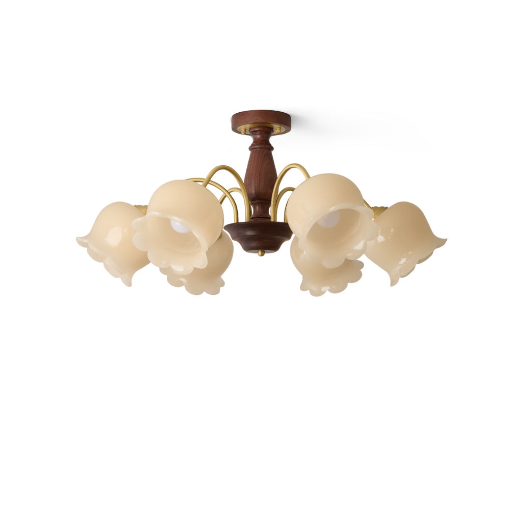 Cacier Flower Chandelier with six glass shades in a living room.