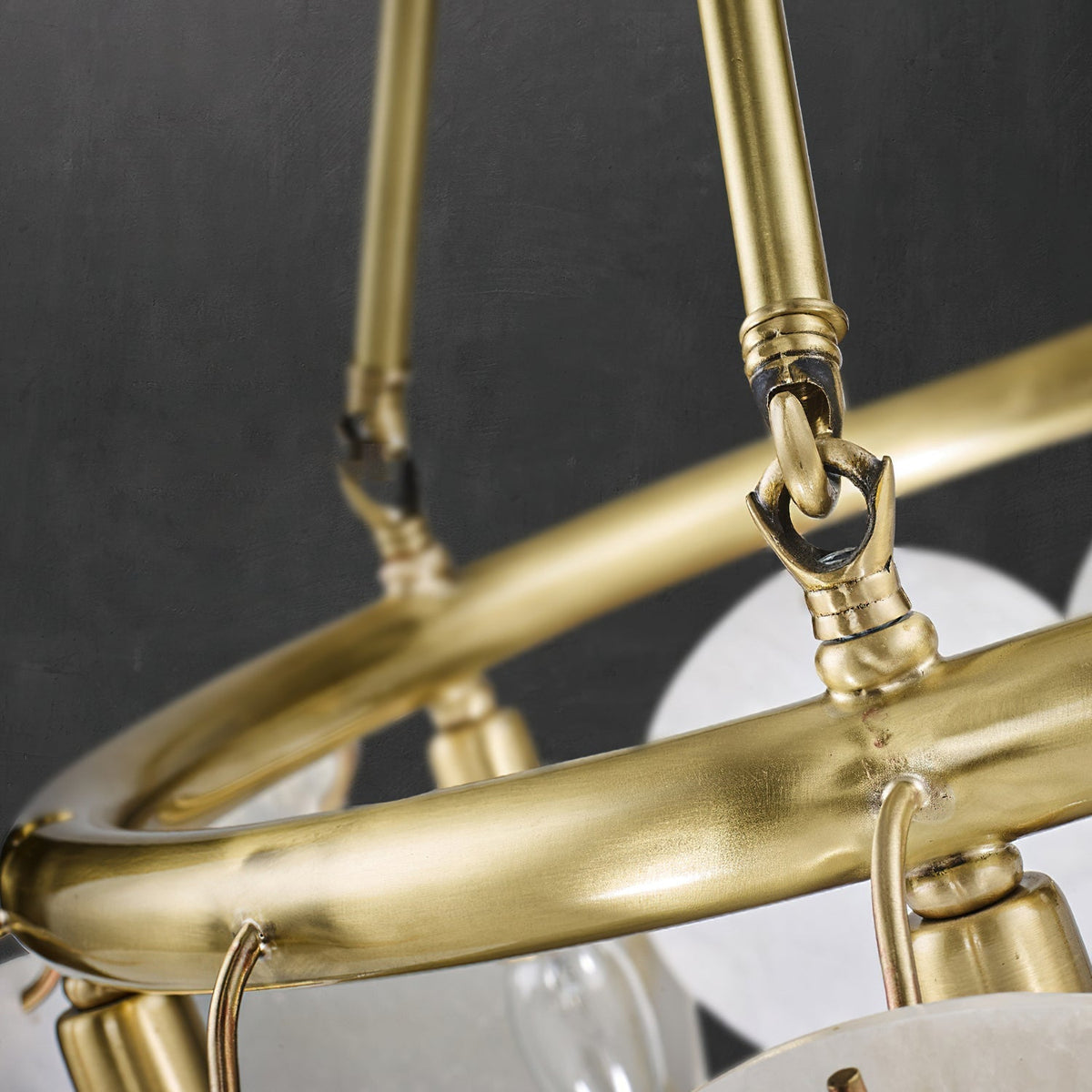 The large 10-light Calamete Chandelier as a centerpiece in a high-ceiling room.