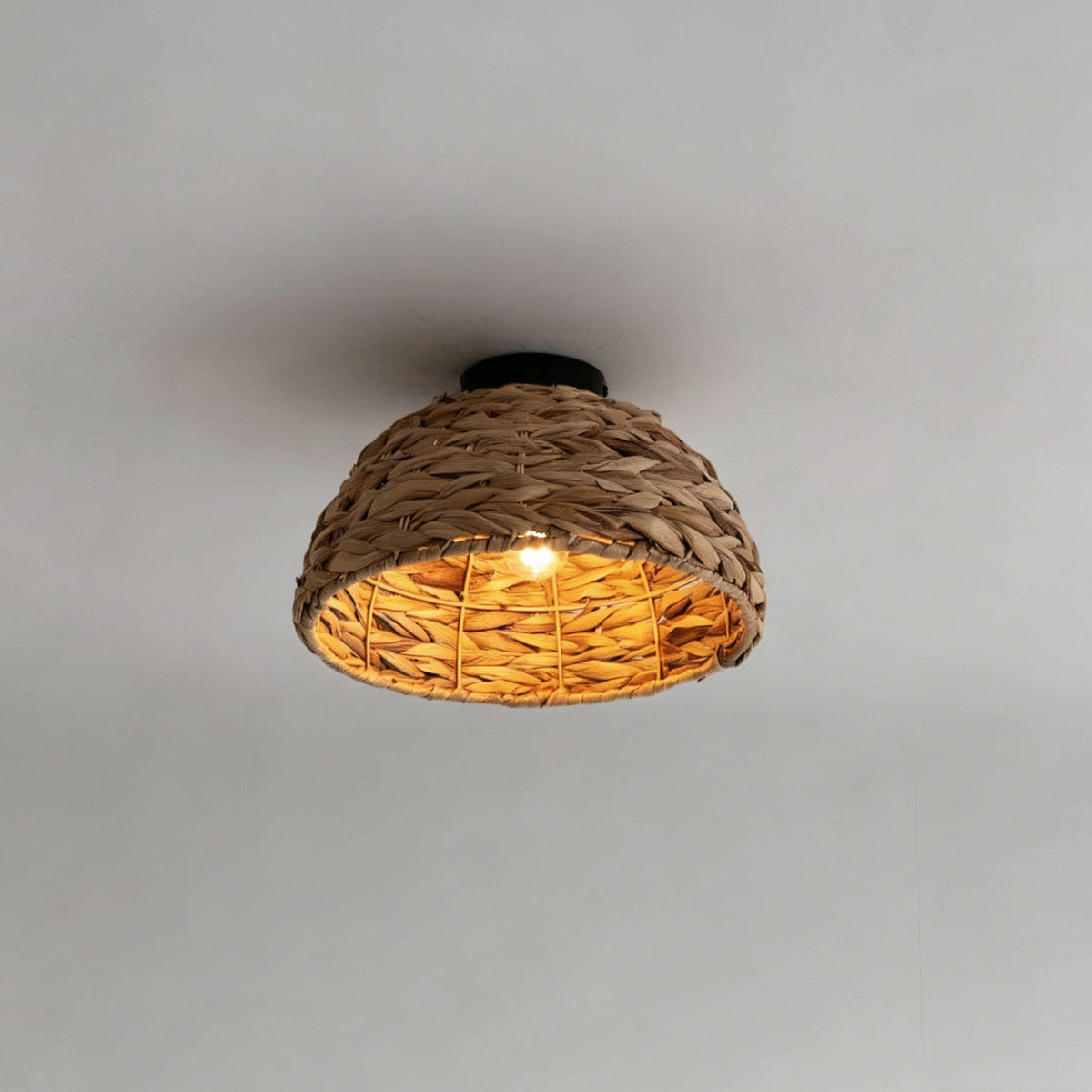 Close-up view of the intricate brown weave of the Cambria Ceiling Light.