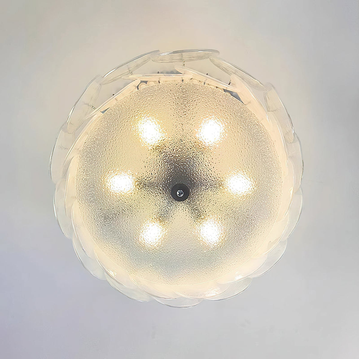 The Camden light in a bedroom setting, turned on.
