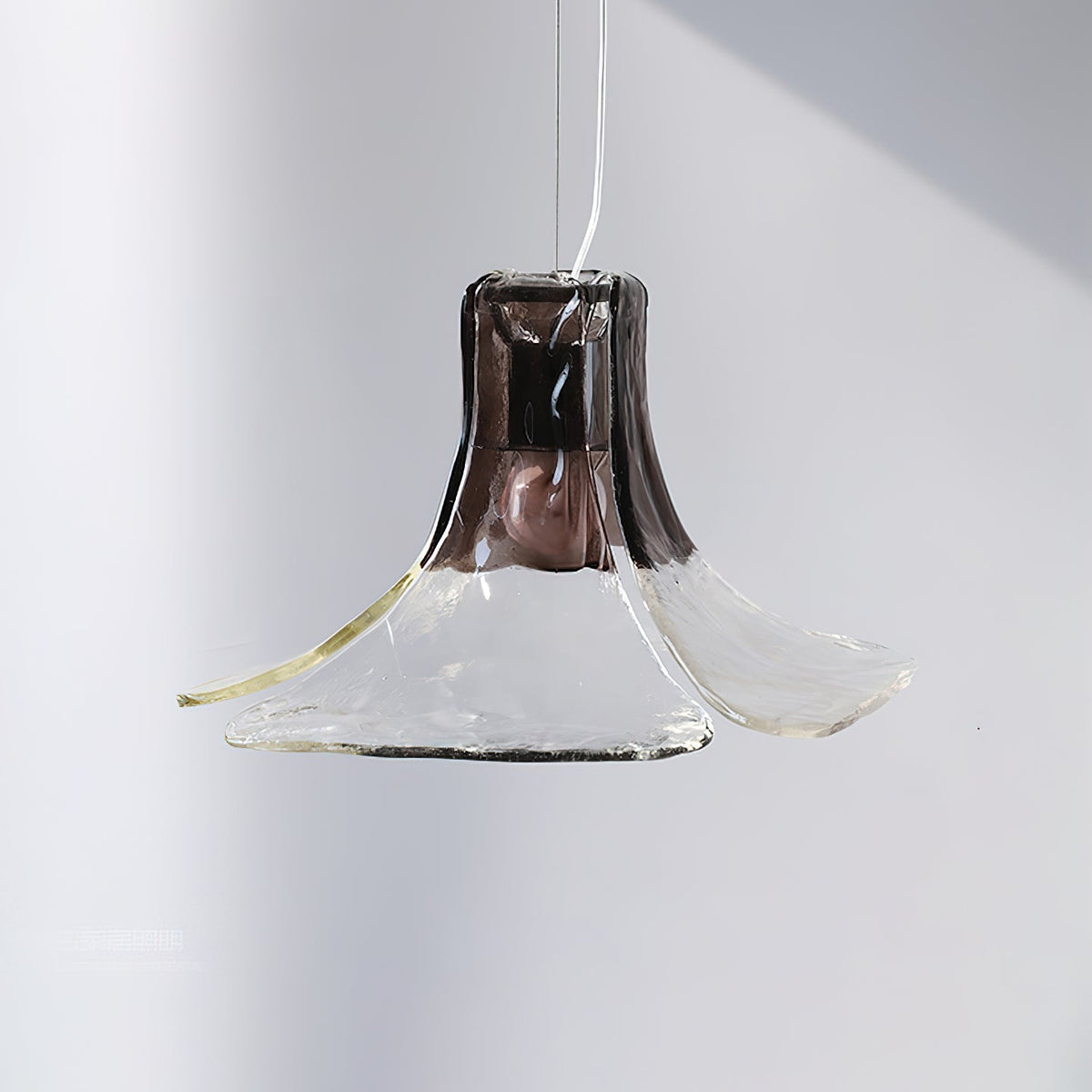 Carlo Pendant Light in the smoky gray and clear color option.