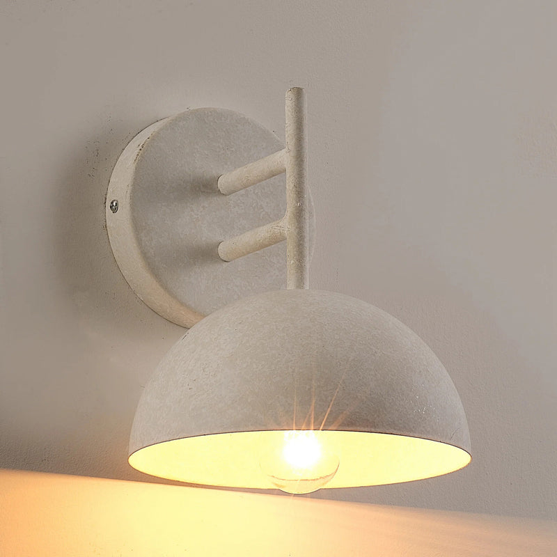The Castle Wall Light illuminated, casting a warm glow.