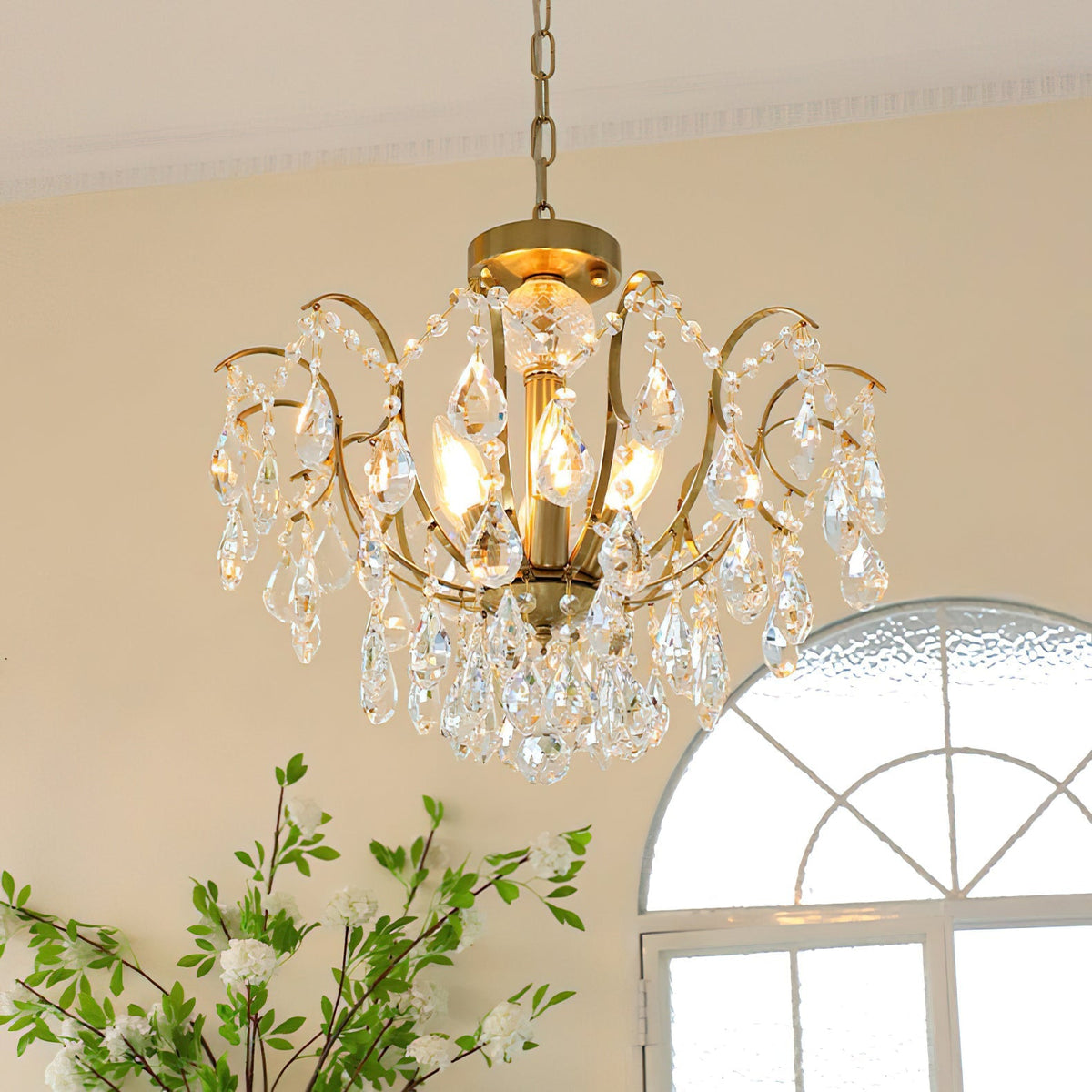 Angled view showcasing the chandelier's feminine silhouette.