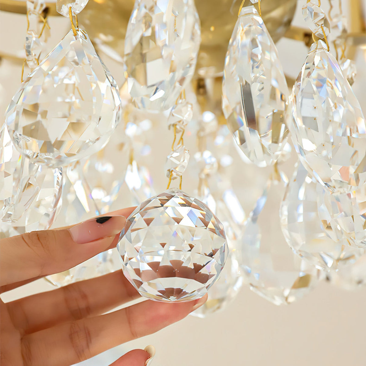 Lifestyle image of the chandelier in a French-inspired room.