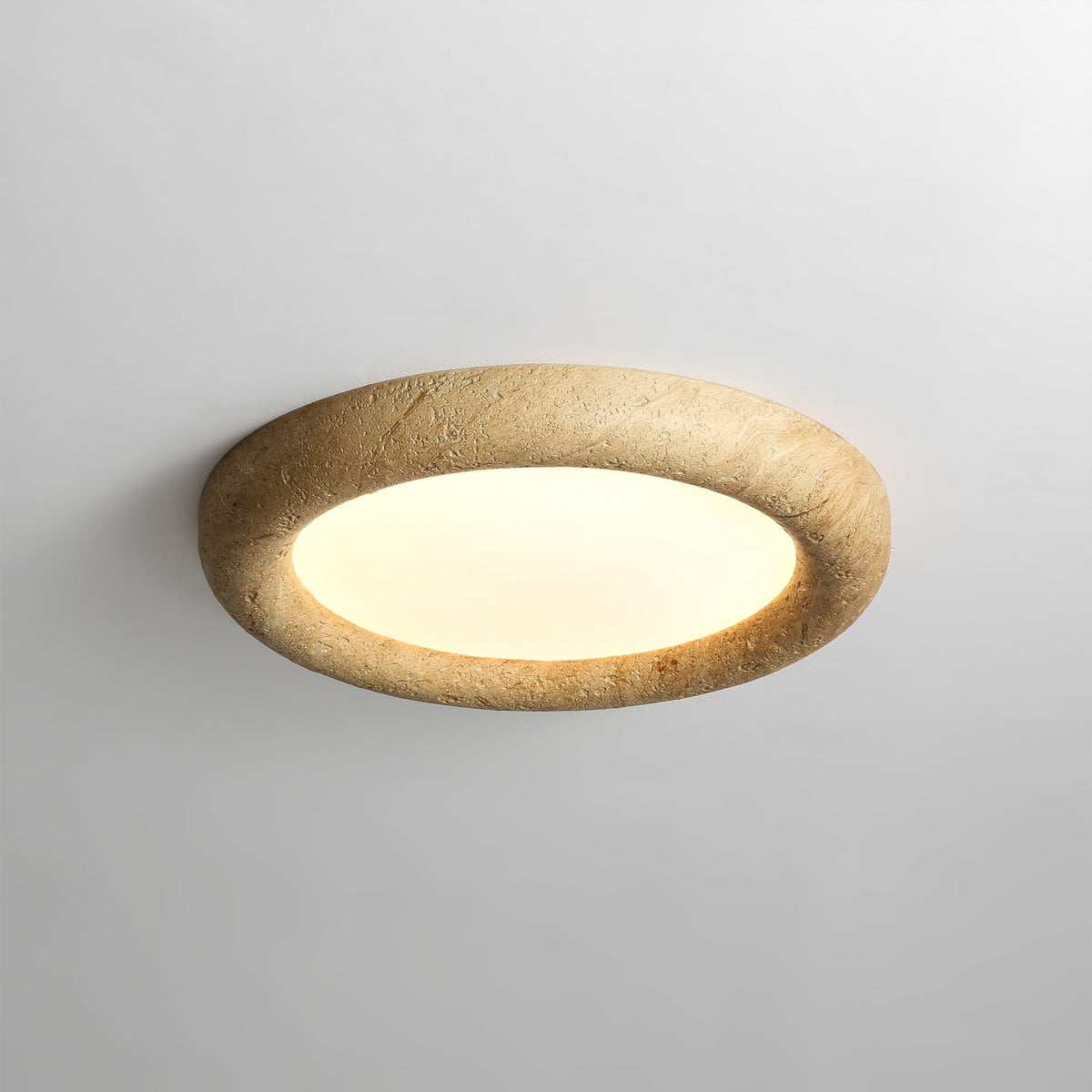 Angled view of the minimalist ceiling light, highlighting its slim profile.