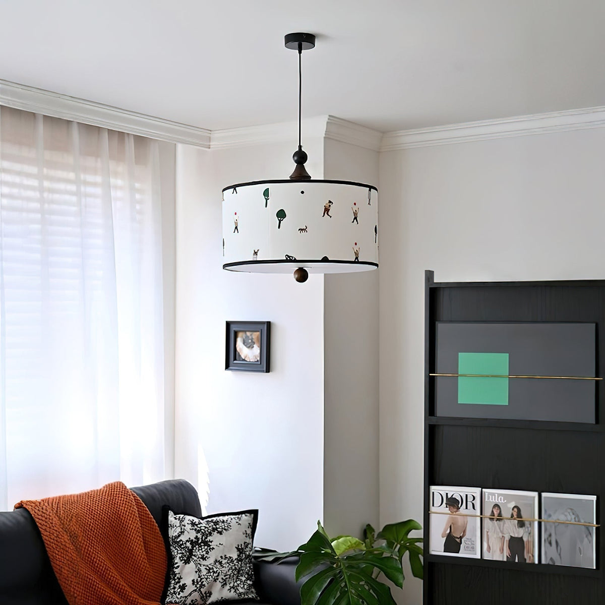 Lifestyle image of the Congo Pendant Light over a casual dining table.