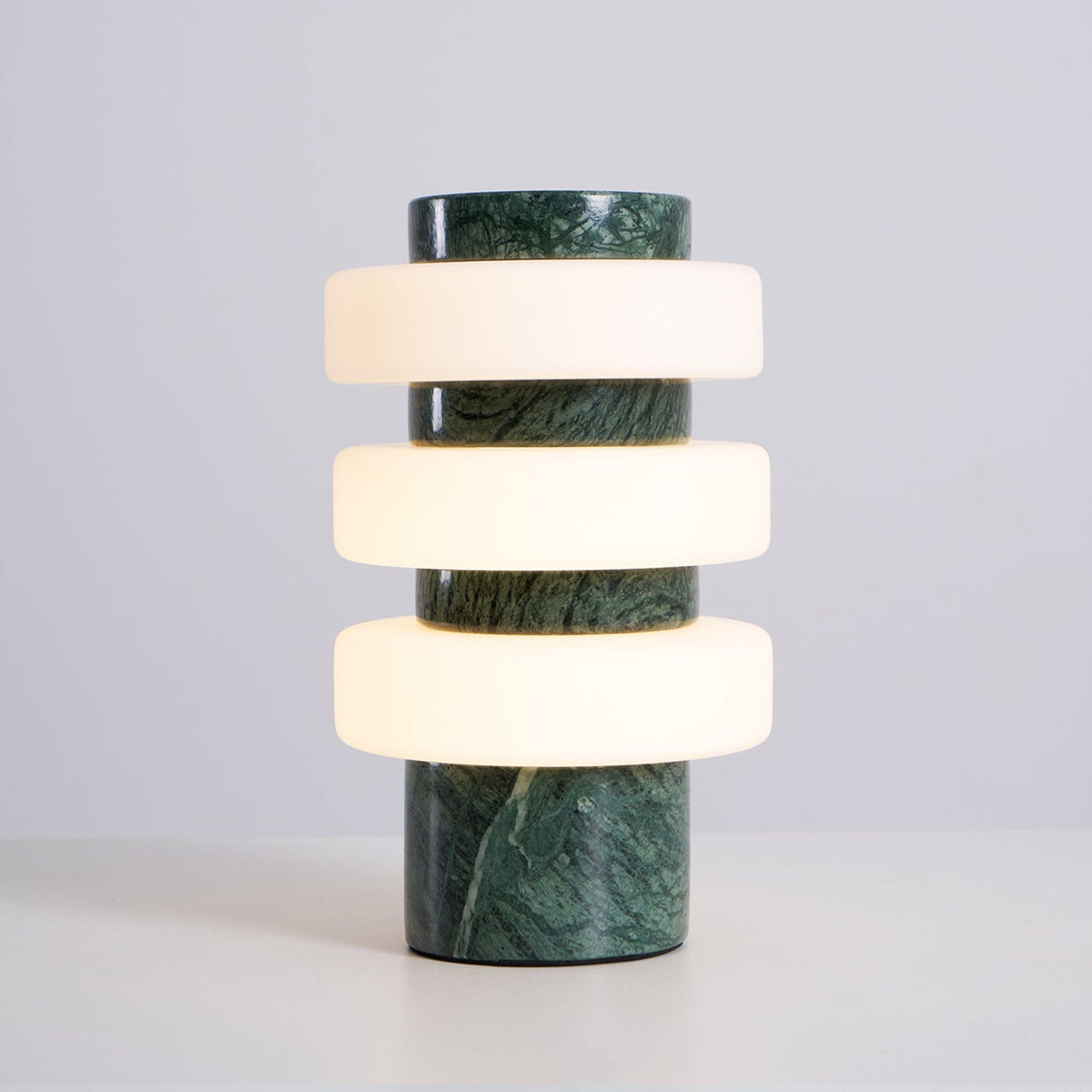 Side profile of the white Corba Table Lamp.