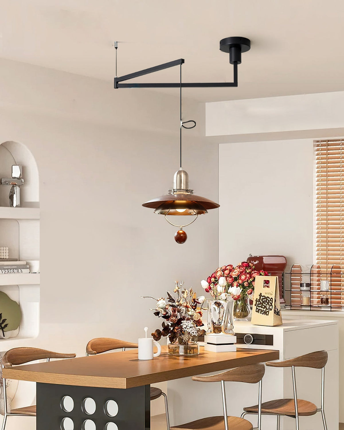 Angled view of the Cullen Swing Arm Pendant Light showing its sculptural form.