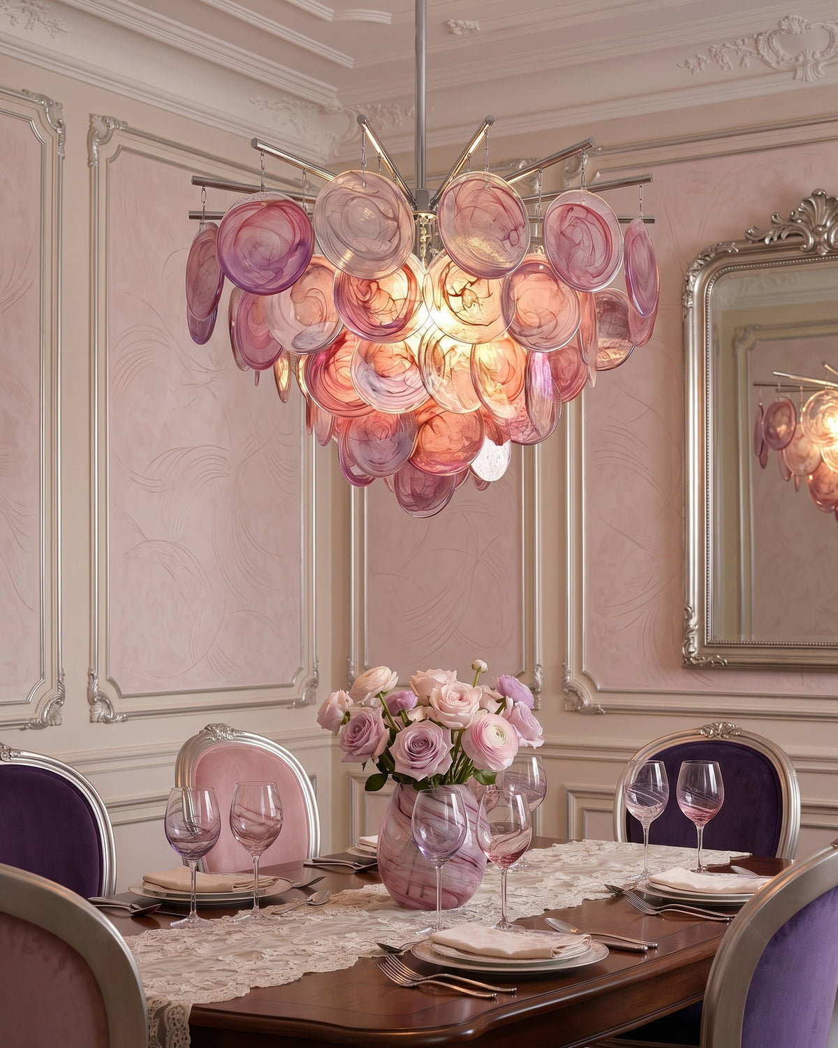 The Camisa Glass Chandelier illuminated in a dark room.